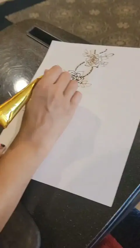 A henna design drawn on paper the morning before the festival